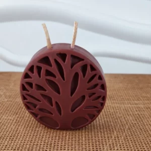 Bougie ronde marron en forme d'arbre de vie
