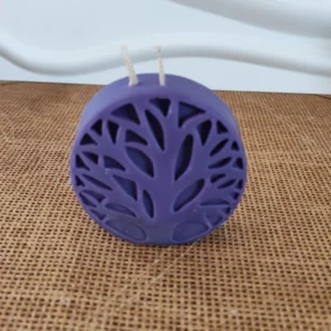 Bougie ronde violette en forme d'arbre de vie